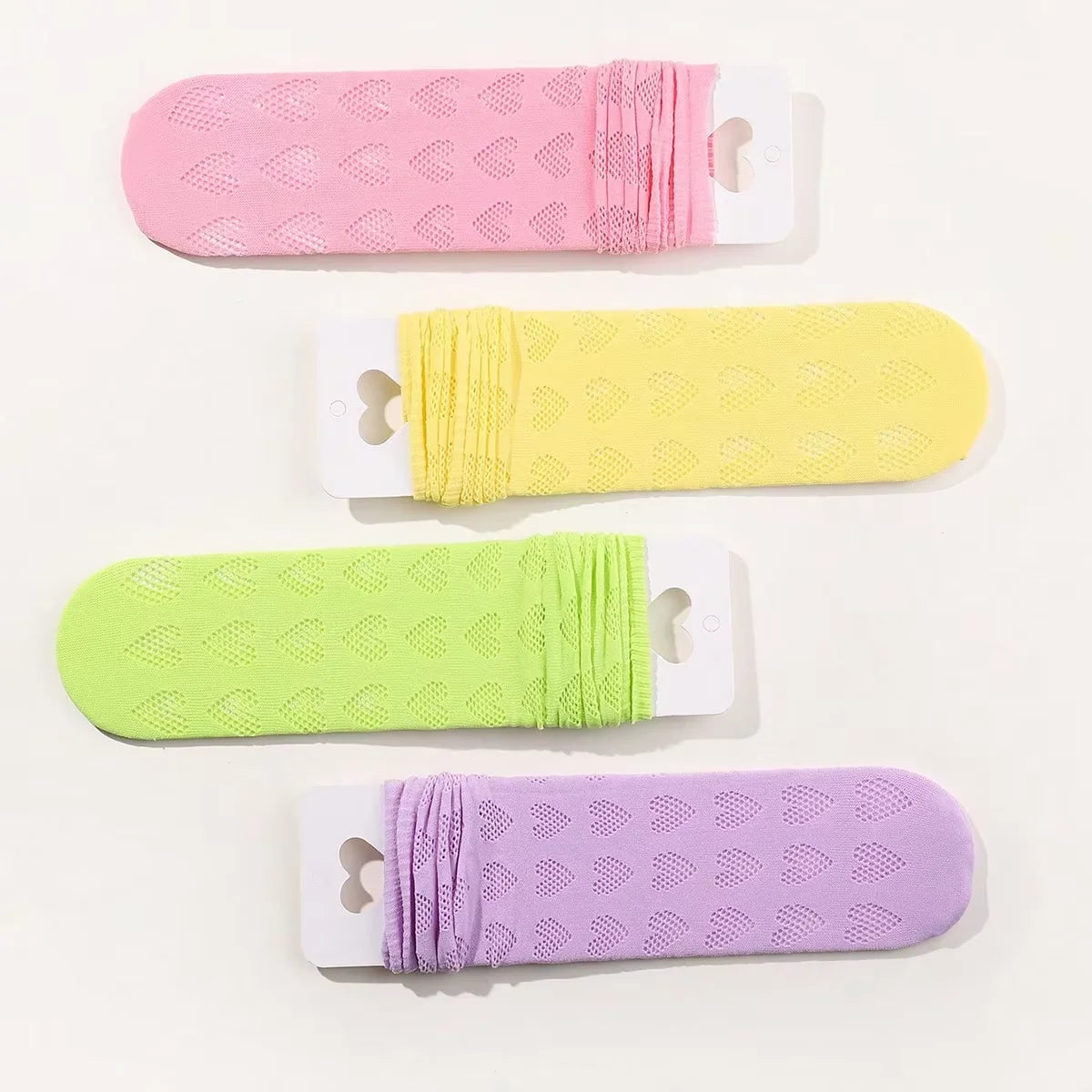 1/4 pairs of girls' dopamine heart hollow mesh straight socks, lightweight breathable heart mesh socks, women's long tube